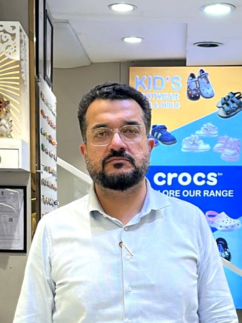 Raman Chanana, Owner of Charu Shoes, in the store